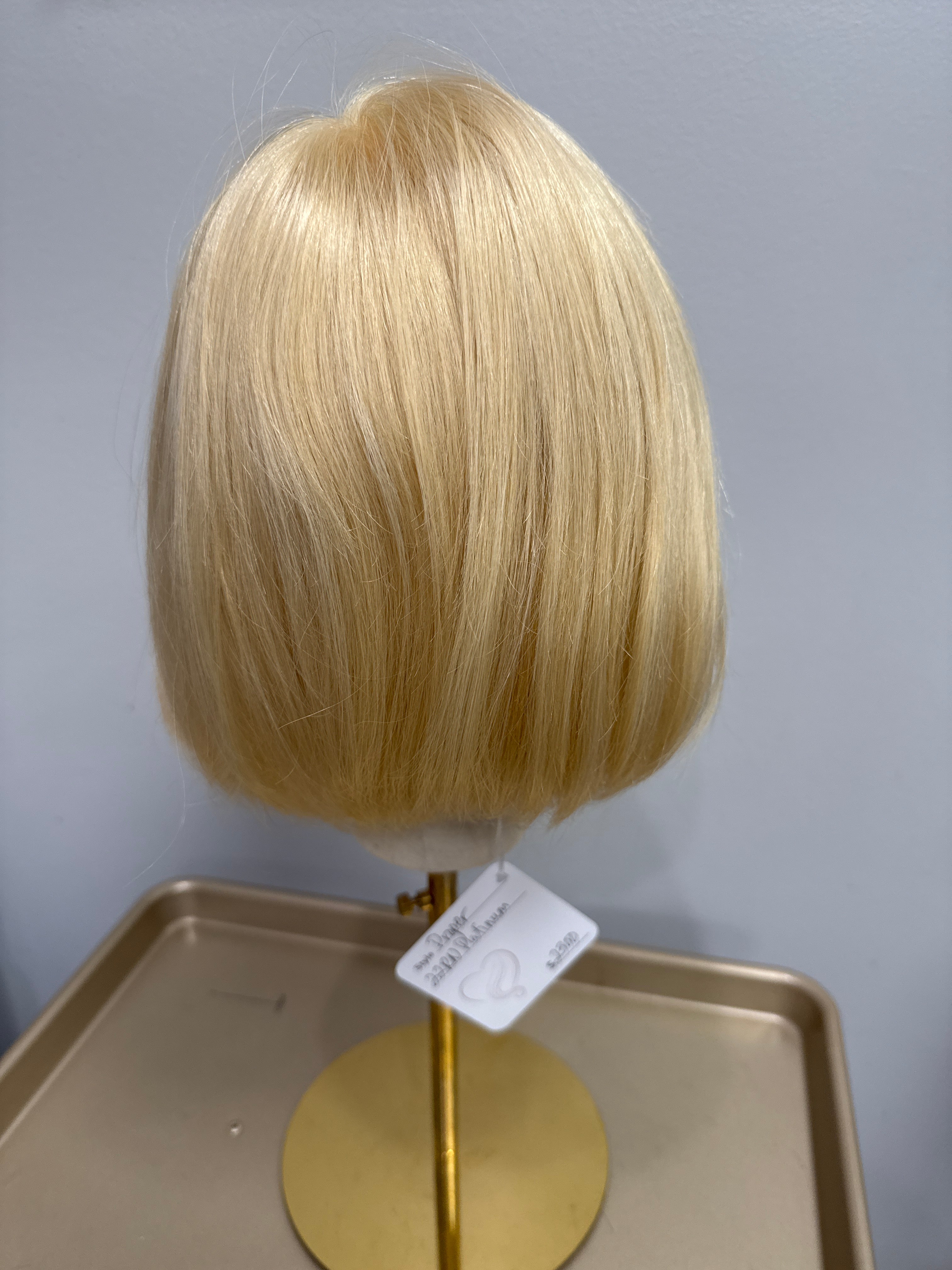 Proper Light Blonde Chin Length Bob