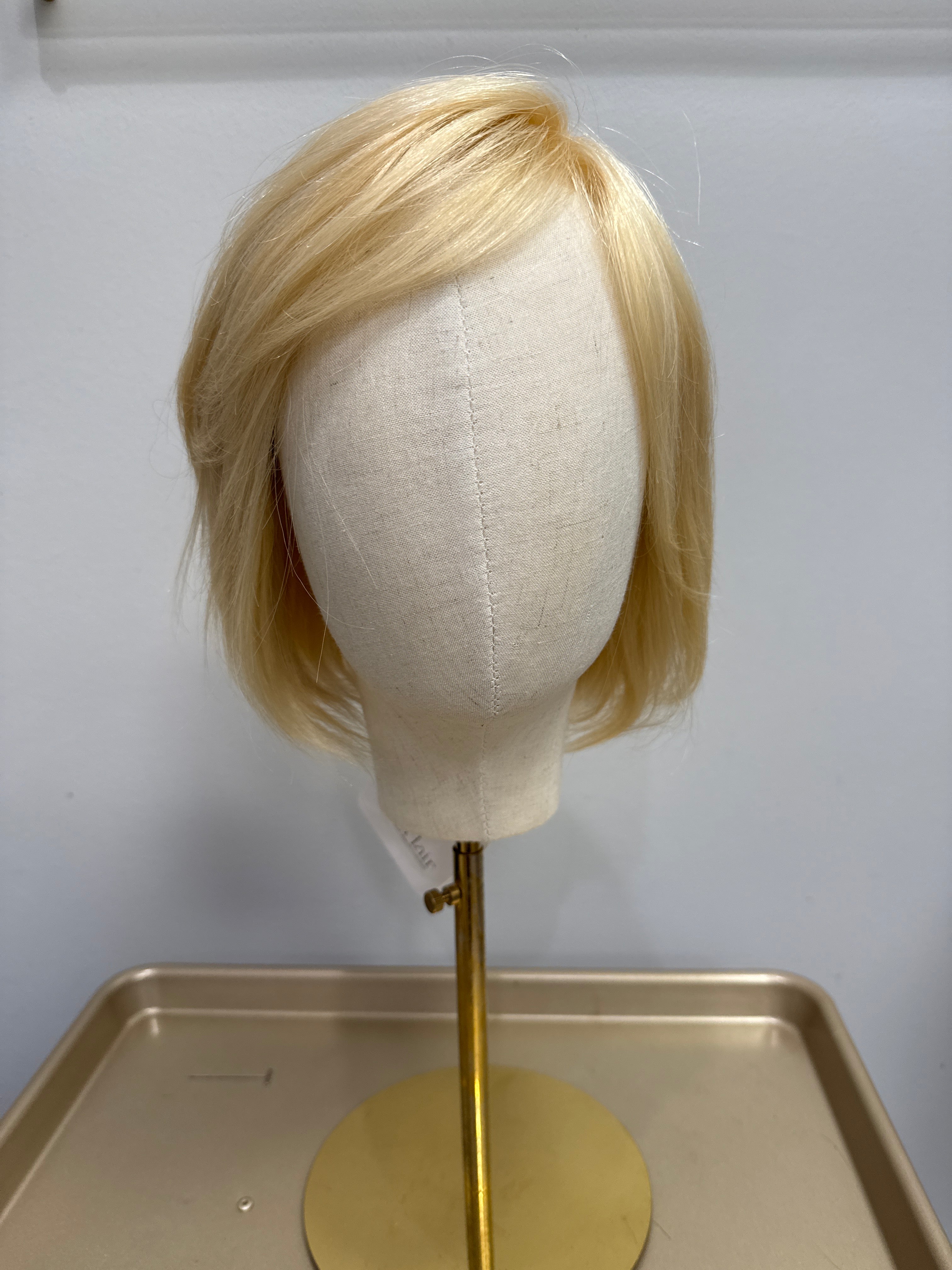 Proper Light Blonde Chin Length Bob