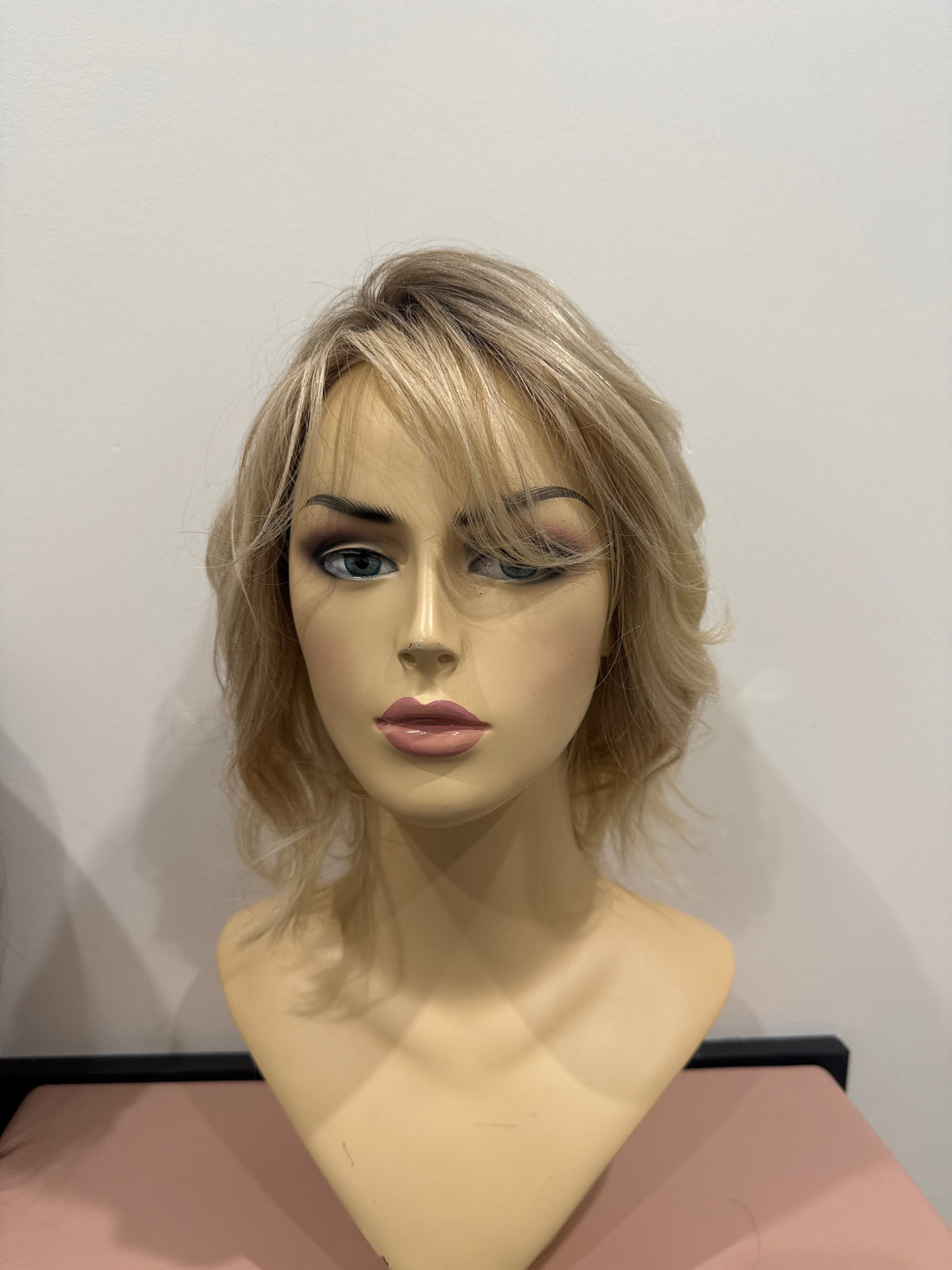 Napa Light Blonde rooted with highlights